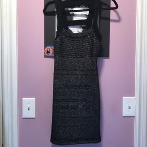 Sparkling mini dress with awesome back cut outs